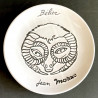 Assiette en faïence "bélier" par Jean Marais